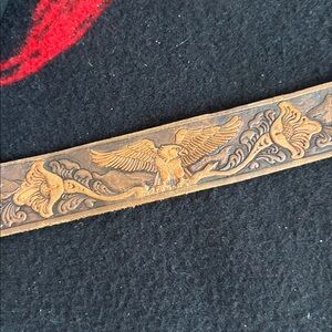 Vintage tooled leather belt.